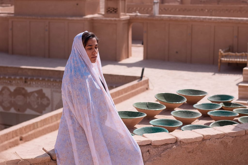 Iran: A local woman wearing chador