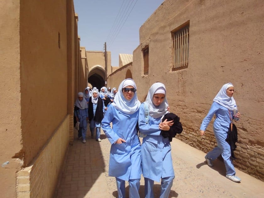 Students in the Old town of Yazd