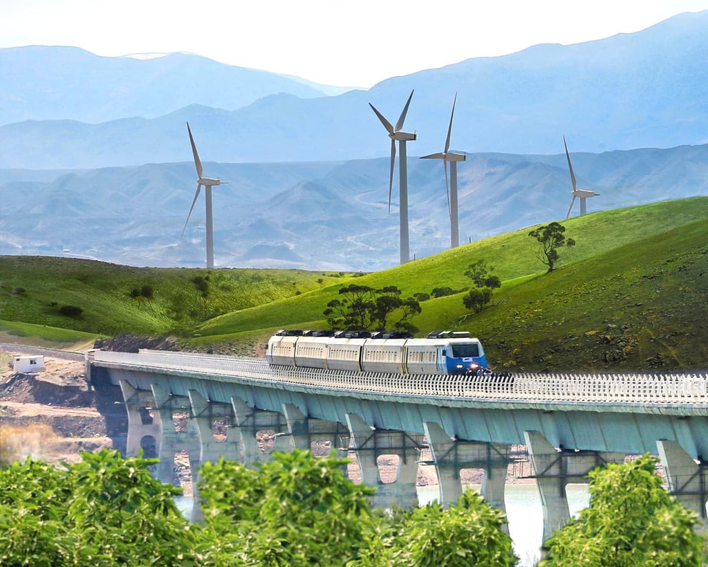 Iran Train Booking Orienttrips Raja Company's High-Speed Train En Route From Tehran To Gilan, Passing By The Manjil Wind Turbines.