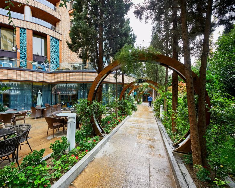 Outdoor Area Of Parsian Kowsar Hotel