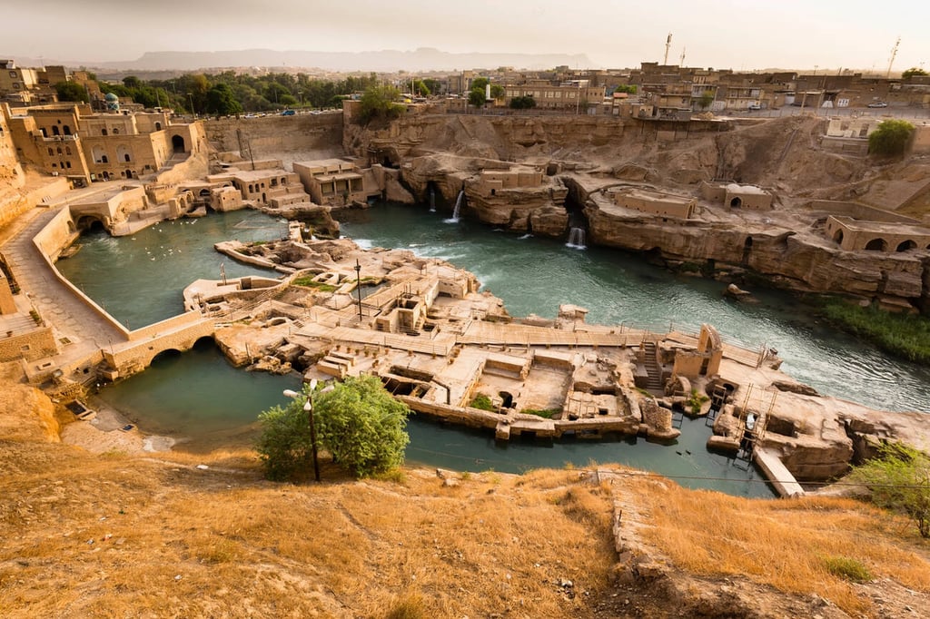 Photographing Iran At Shushtar'S Ancient Hydraulic System Showcases A Blend Of Engineering And Nature, With Cascading Waterfalls And Stone Structures Offering Dynamic Photography Opportunities Against A Historical Backdrop.