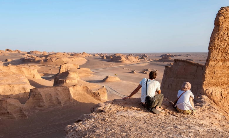 Tourists Watch The Sun Go Down Over Yardangs In The Lut Desert In Shahad, Ian