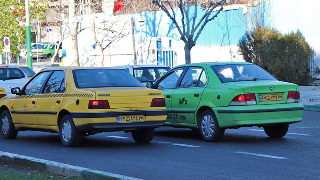 Yellow And Green Taxis In Kermanshah, Iran