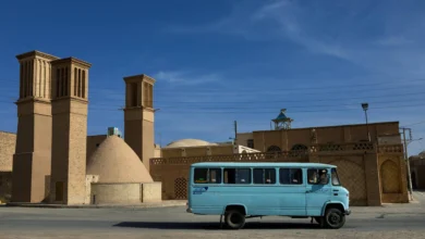 Bus In Front Of Wind Towers, Nain, Iran