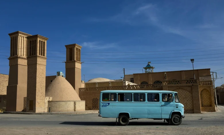 Bus In Front Of Wind Towers, Nain, Iran