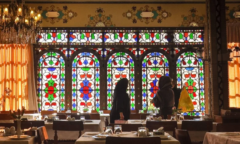 Local Women Dressed In Chador Gathered For Lunch In Restaurant Shahrzad, Isfahan, Iran Intricate Stainedc Glass Windows